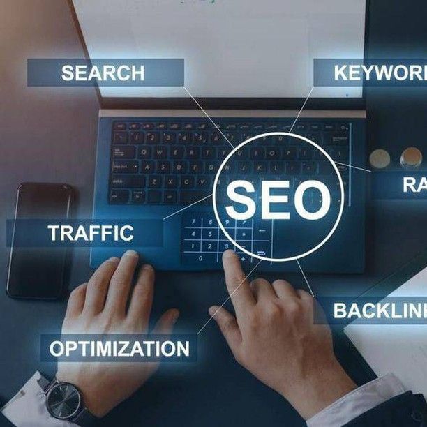 SEO concept with keywords, optimization, and traffic elements around a keyboard